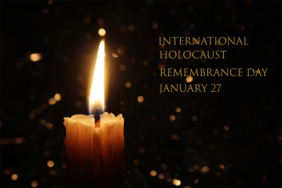 A photograph of a lit candle emerging from the darkness. Text reads: International Holocaust Remebrance Day: Jan. 27, 2025