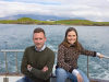 A photograph of Katrín Jakobsdóttir & Ragnar Jónasson on a boat at sea